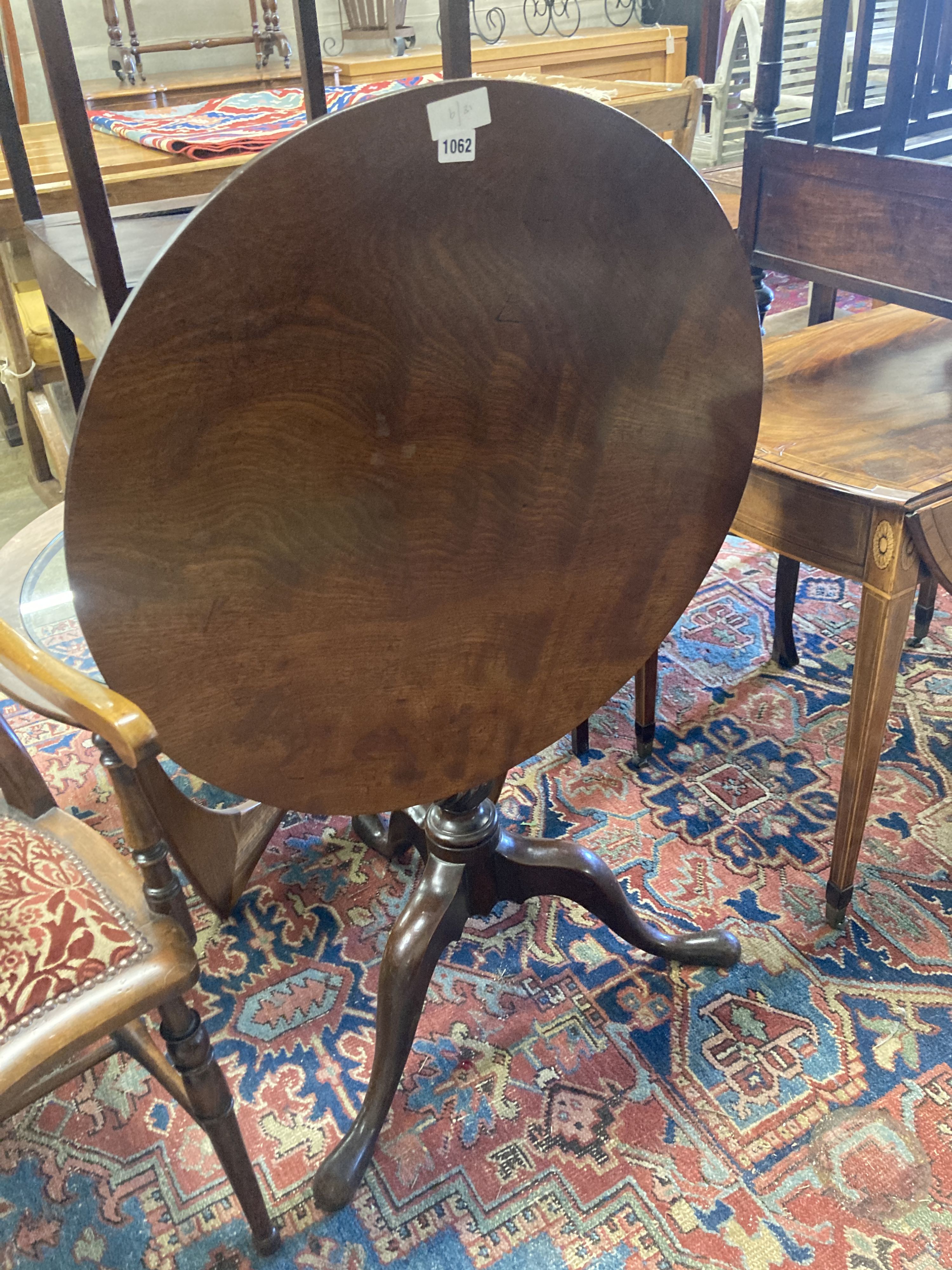 A George III and later circular tilt top tea table, diameter 70cm, height 68cm